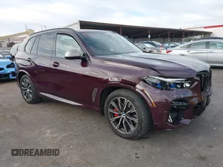 2021 BMW X5 M50i with VIN 5UXJU4C04M9G03418, listed as a IAAI auction lot 40705167 with 24,073 mi miles. Bid and sale history available at carsss.com. Image 1.