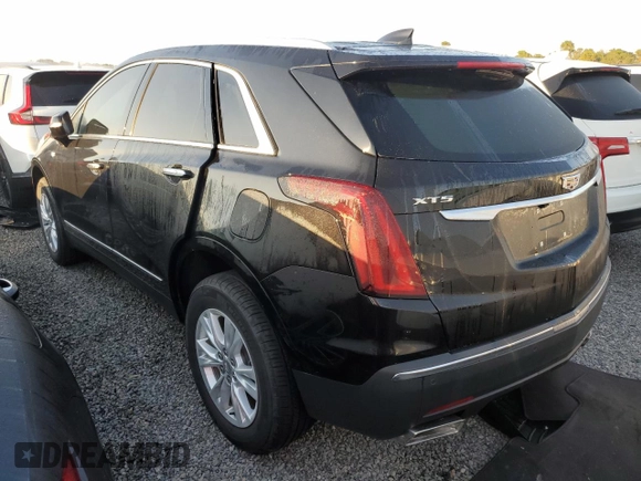 2022 Cadillac XT5 FWD Luxury z VIN 1GYKNAR47NZ100986, wystawiony jako Copart lot #83144574 z przebiegiem Nie podano mil oraz Nie do naprawy • Non repairable. Historia ofert i sprzedaży dostępna na DreamBid. Obrazek 2.