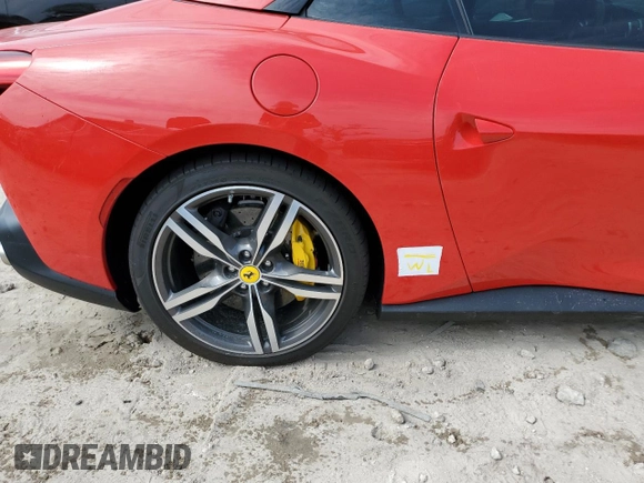 2019 Ferrari Portofino z VIN ZFF89FPA0K0242592, wystawiony jako Copart lot #74249014 z przebiegiem Nie podano mil oraz Nie do naprawy. Historia ofert i sprzedaży dostępna na DreamBid. Obrazek 12.