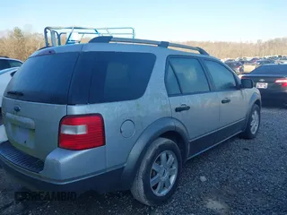 2005 Ford Freestyle SE with VIN 1FMZK01165GA52333, listed as a IAAI auction lot 41062704 with 234,459 mi miles. Bid and sale history available at carsss.com. Image 4.