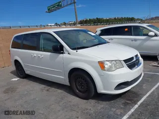 2012 Dodge Grand Caravan SE with VIN 2C4RDGBG9CR324590, listed as a IAAI auction lot 41644865 with 174,469 mi miles. Bid and sale history available at carsss.com. Image 1.