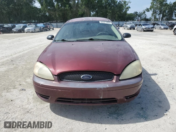 2007 Ford Taurus SE with VIN 1FAFP53U17A151246, listed as a Copart auction lot 60221955 with 284,321 mi miles and Salvage title. Bid and sale history available at DreamBid. Image 5.