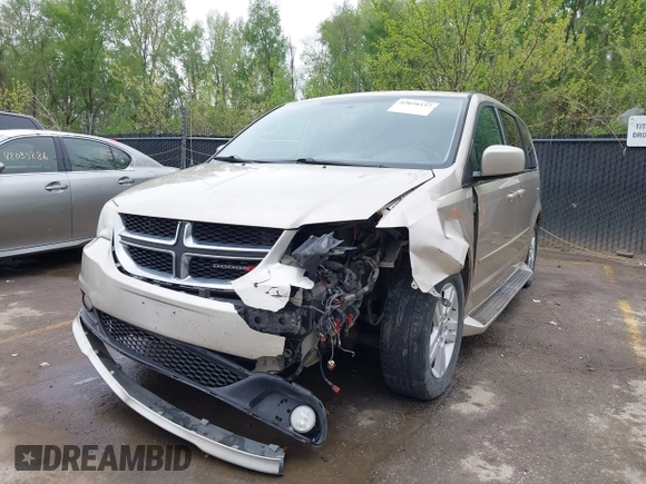 2013 Dodge Grand Caravan Crew with VIN 2C4RDGDG7DR624563, listed as a IAAI auction lot 42038157 with 265,044 mi miles and . Bid and sale history available at DreamBid. Image 6.