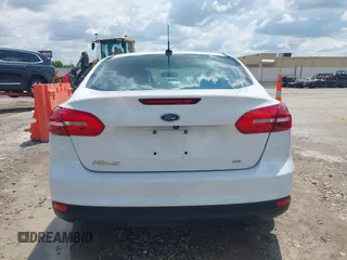 2016 Ford Focus SE z VIN 1FADP3F29GL346196, wystawiony jako IAAI lot #42171014 z przebiegiem 80 913 mil mil oraz . Historia ofert i sprzedaży dostępna na DreamBid. Obrazek 16.