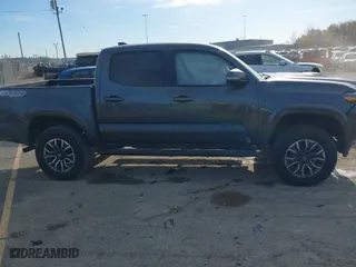 2023 Toyota Tacoma 4WD SR with VIN 3TMCZ5AN8PM574766, listed as a IAAI auction lot 40663003 with 43,978 mi miles. Bid and sale history available at carsss.com. Image 14.
