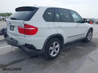 2010 BMW X5 35d with VIN 5UXFF0C52ALT75063, listed as a IAAI auction lot 41924828 with 104,513 mi miles. Bid and sale history available at carsss.com. Image 4.