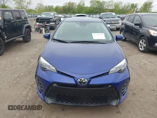 2018 Toyota Corolla L with VIN 2T1BURHE5JC973402, listed as a IAAI auction lot 42221771 with 47,282 mi miles and . Bid and sale history available at DreamBid. Image 12.