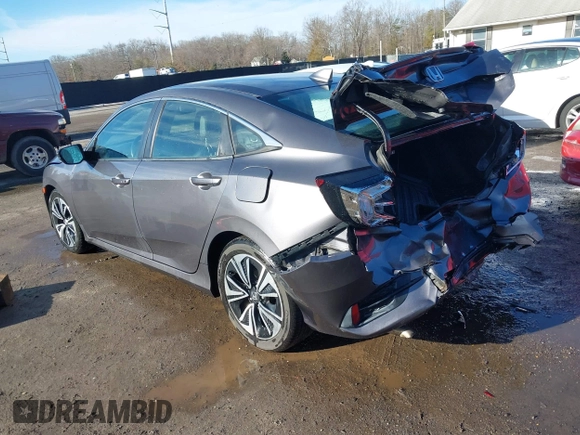 2017 Honda Civic Sedan EX-L with VIN 2HGFC1F70HH633263, listed as a IAAI auction lot 41511642 with 65,769 mi miles. Bid and sale history available at carsss.com. Image 3.