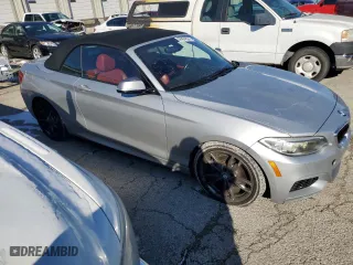 2015 BMW 2 Series M235i with VIN WBA1M1C53FV393443, listed as a Copart auction lot 38404834 with 69,299 mi miles and Clean Title. Bid and sale history available at carsss.com. Image 4.