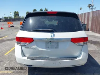 2015 Honda Odyssey EX-L with VIN 5FNRL5H67FB017554, listed as a IAAI auction lot 41974821 with 76,130 mi miles and . Bid and sale history available at carsss.com. Image 16.
