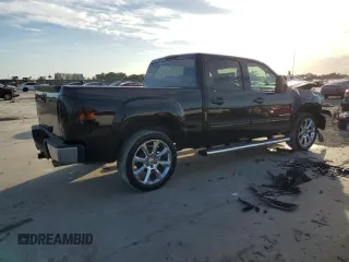 2010 GMC Sierra 1500 SLT with VIN 3GTRCWE03AG287390, listed as a Copart auction lot 87533655 with 163,253 mi miles and Salvage title. Bid and sale history available at DreamBid. Image 3.