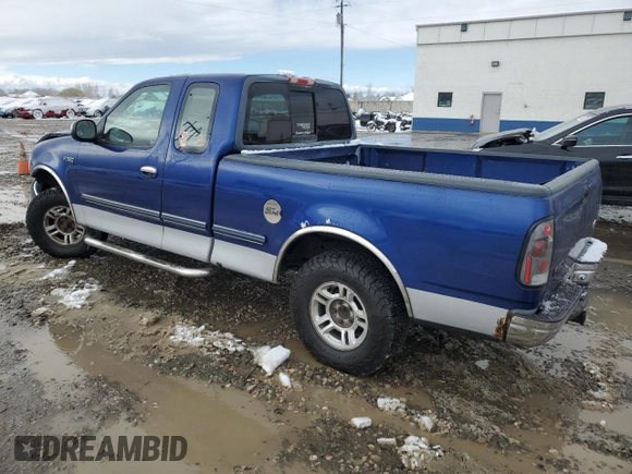 1997 Ford F-150 XL with VIN 1FTEX17LXVKB44786, listed as a Copart auction lot 49630955 with 301,736 mi miles and Salvage title. Bid and sale history available at DreamBid. Image 2.