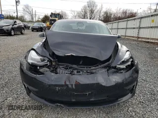2019 Tesla Model 3 Long Range with VIN 5YJ3E1EB2KF197062, listed as a Copart auction lot 50874925 with 50,989 mi miles and Salvage Title. Bid and sale history available at carsss.com. Image 5.