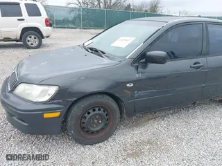 2003 Mitsubishi Lancer ES with VIN JA3AJ26E83U015342, listed as a IAAI auction lot 41819617 with 355,658 mi miles. Bid and sale history available at carsss.com. Image 6.