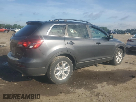 2015 Mazda CX-9 Touring z VIN JM3TB3CA2F0460970, wystawiony jako Copart lot #61544015 z przebiegiem 102 190 mil mil oraz Czysty tytuł • Clean title. Historia ofert i sprzedaży dostępna na DreamBid. Obrazek 3.