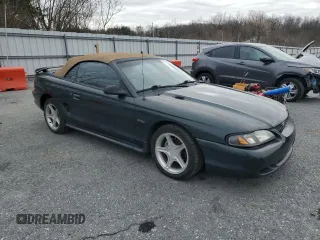 1998 Ford Mustang GT with VIN 1FAFP45XXWF160692, listed as a Copart auction lot 47210885 with 180,035 mi miles and Salvage Title. Bid and sale history available at carsss.com. Image 4.