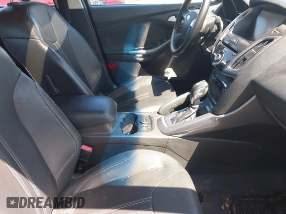 2013 Ford Focus Titanium with VIN 1FADP3J22DL106166, listed as a IAAI auction lot 42233351 with 108,300 mi miles and . Bid and sale history available at carsss.com. Image 5.