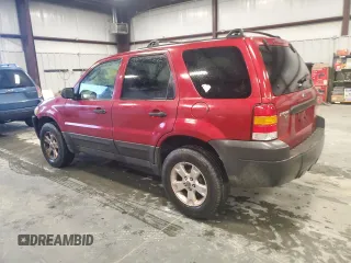 2007 Ford Escape XLT with VIN 1FMYU03Z27KA05874, listed as a Copart auction lot 73295564 with 127,088 mi miles and Salvage Title. Bid and sale history available at carsss.com. Image 2.