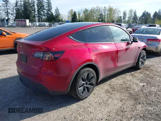 2024 Tesla Model Y Long Range with VIN 7SAYGDEE9RF199805, listed as a IAAI auction lot 42018221 with 7,359 mi miles. Bid and sale history available at carsss.com. Image 4.