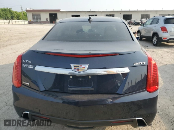 2017 Cadillac CTS Luxury AWD with VIN 1G6AX5SX7H0141380, listed as a Copart auction lot 58999135 with 91,003 mi miles and Salvage title. Bid and sale history available at DreamBid. Image 6.