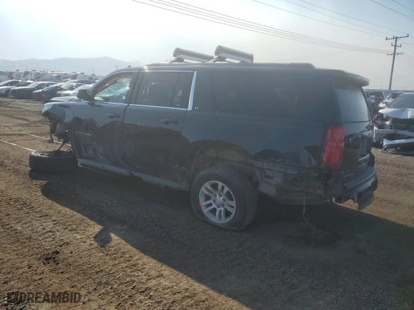 2017 Chevrolet Suburban LT with VIN 1GNSKHKC5HR163282, listed as a Copart auction lot 81924784 with 58,083 mi miles and Salvage Title. Bid and sale history available at carsss.com. Image 2.