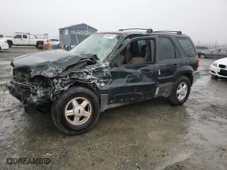 2003 Ford Escape XLS Popular with VIN 1FMYU021X3KA70123, listed as a Copart auction lot 86005514 with 0 mi miles and Salvage Title. Bid and sale history available at carsss.com. Image 1.