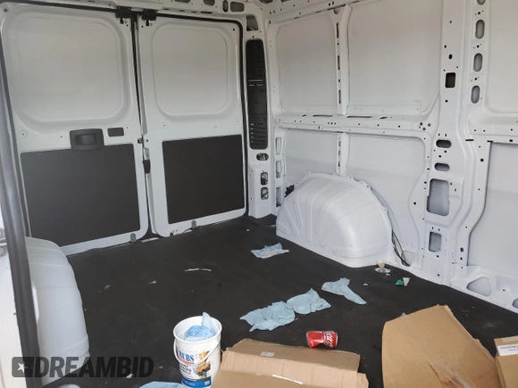 2023 Ram ProMaster Cargo with VIN 3C6LRVVG5PE589982, listed as a Copart auction lot 65990094 with 11,410 mi miles and Salvage Title. Bid and sale history available at DreamBid. Image 11.