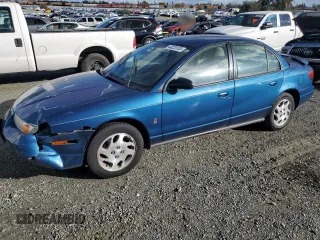 2000 Saturn SL z VIN 1G8ZK5279YZ155916, wystawiony jako Copart lot #44225105 z przebiegiem 97 788 mil mil oraz Szkoda całkowita • Salvage title. Historia ofert i sprzedaży dostępna na DreamBid. Obrazek 1.