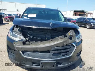 2019 Chevrolet Traverse LS with VIN 1GNERFKW1KJ310856, listed as a IAAI auction lot 41806247 with 88,501 mi miles. Bid and sale history available at carsss.com. Image 6.