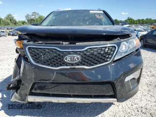 2012 Kia Sorento SX with VIN 5XYKWDA28CG300110, listed as a Copart auction lot 57994995 with 120,228 mi miles and Salvage title. Bid and sale history available at DreamBid. Image 5.