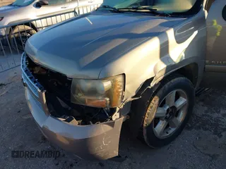 2007 Chevrolet Suburban LS with VIN 1GNFC16037J337224, listed as a IAAI auction lot 41297347 with 256,162 mi miles. Bid and sale history available at carsss.com. Image 6.