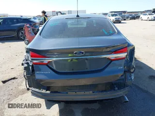 2017 Ford Fusion SE z VIN 3FA6P0H79HR412250, wystawiony jako IAAI lot #41984265 z przebiegiem 108 106 mil mil oraz . Historia ofert i sprzedaży dostępna na DreamBid. Obrazek 16.