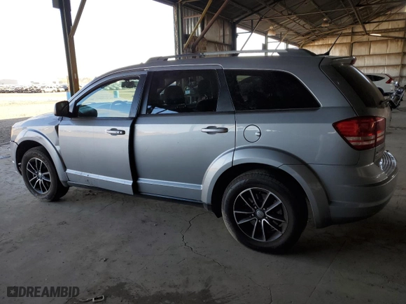 2017 Dodge Journey SE with VIN 3C4PDCAB0HT586914, listed as a Copart auction lot 88232385 with 359,234 mi miles and Clean Title. Bid and sale history available at carsss.com. Image 2.