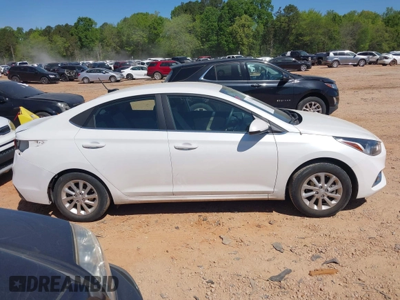2021 Hyundai Accent SE with VIN 3KPC24A65ME137479, listed as a IAAI auction lot 41951290 with 32,636 mi miles and . Bid and sale history available at DreamBid. Image 14.