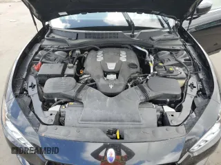 2015 Maserati Ghibli z VIN ZAM57XSA5F1129866, wystawiony jako Copart lot #51738015 z przebiegiem Nie podano mil oraz Szkoda całkowita • Salvage title. Historia ofert i sprzedaży dostępna na DreamBid. Obrazek 11.
