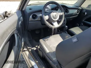 2006 MINI Hardtop with VIN WMWRC33586TJ77908, listed as a Copart auction lot 55095525 with 143,810 mi miles and Salvage title. Bid and sale history available at DreamBid. Image 8.