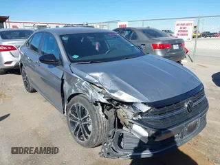 2023 Volkswagen Jetta Sport with VIN 3VWBM7BU5PM016768, listed as a IAAI auction lot 41427777 with 32,950 mi miles and . Bid and sale history available at DreamBid. Image 13.