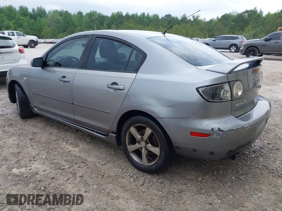 2005 Mazda 3 s with VIN JM1BK123551254112, listed as a IAAI auction lot 42153452 with 258,826 mi miles and . Bid and sale history available at DreamBid. Image 3.