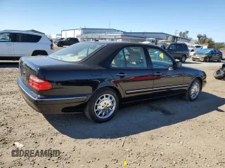 2001 Mercedes-Benz E-Class with VIN WDBJF65J51B386619, listed as a Copart auction lot 46623515 with 108,209 mi miles and Salvage Title. Bid and sale history available at carsss.com. Image 3.