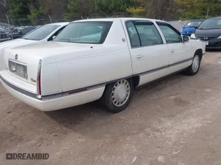 1996 Cadillac DeVille with VIN 1G6KD52Y9TU305784, listed as a IAAI auction lot 41933737 with 92,493 mi miles. Bid and sale history available at carsss.com. Image 4.