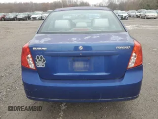 2006 Suzuki Forenza z VIN KL5JD56ZX6K372427, wystawiony jako Copart lot #80627544 z przebiegiem 94 493 mil mil oraz Tytuł czysty. Historia ofert i sprzedaży dostępna na DreamBid. Obrazek 6.