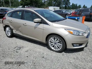 2017 Ford Focus Titanium with VIN 1FADP3N2XHL268174, listed as a Copart auction lot 59761415 with 53,522 mi miles and Salvage title. Bid and sale history available at DreamBid. Image 4.