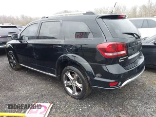 2016 Dodge Journey Crossroad z VIN 3C4PDCGG5GT140131, wystawiony jako IAAI lot #41361900 z przebiegiem 185 176 mil mil oraz . Historia ofert i sprzedaży dostępna na DreamBid. Obrazek 3.