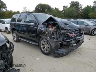2017 GMC Yukon SLT with VIN 1GKS2BKC2HR406007, listed as a Copart auction lot 71702084 with 66,828 mi miles and Salvage Title. Bid and sale history available at carsss.com. Image 4.
