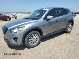 2015 Mazda CX-5 Sport z VIN JM3KE2BE3F0460087, wystawiony jako Copart lot #62625434 z przebiegiem 159 734 mil mil oraz Szkody całkowita. Historia ofert i sprzedaży dostępna na DreamBid. Obrazek 1.