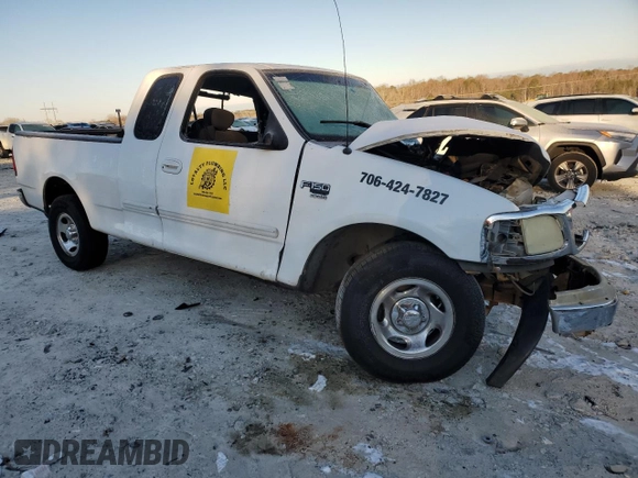 2003 Ford F-150 XL with VIN 1FTRX17W63NA12390, listed as a Copart auction lot 42127405 with 282,656 mi miles and Salvage Title. Bid and sale history available at carsss.com. Image 4.