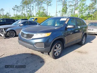 2011 Kia Sorento LX with VIN 5XYKT3A1XBG011576, listed as a IAAI auction lot 42062990 with 227,954 mi miles. Bid and sale history available at carsss.com. Image 2.
