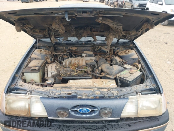 1987 Ford Taurus z VIN 1FABP53U0HA101874, wystawiony jako IAAI lot #42619153 z przebiegiem Nie podano mil oraz . Historia ofert i sprzedaży dostępna na DreamBid. Obrazek 10.