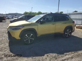 2023 Toyota Corolla Cross Hybrid S z VIN 7MUFBABG0PV004597, wystawiony jako Copart lot #56252015 z przebiegiem 14 623 mil mil oraz Szkoda całkowita • Salvage title. Historia ofert i sprzedaży dostępna na DreamBid. Obrazek 1.