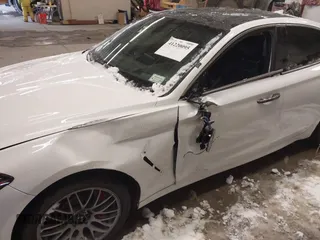 2020 Genesis G70 3.3T with VIN KMTG34LE6LU053580, listed as a IAAI auction lot 41220095 with 75,219 mi miles and . Bid and sale history available at DreamBid. Image 6.